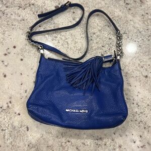 Michael Kors Small Bag.  Silver accents. Interior card holder and pocket.